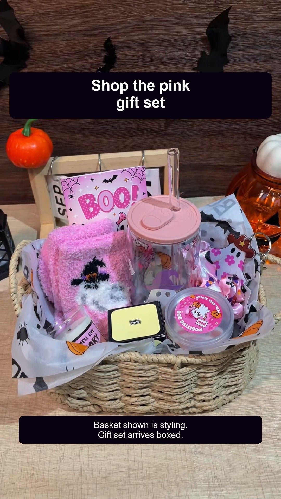 ANOTION pink Halloween Boo Basket gift set styled in a display basket. Basket styling shown; gift set arrives boxed. Wicker basket and decor are display props.