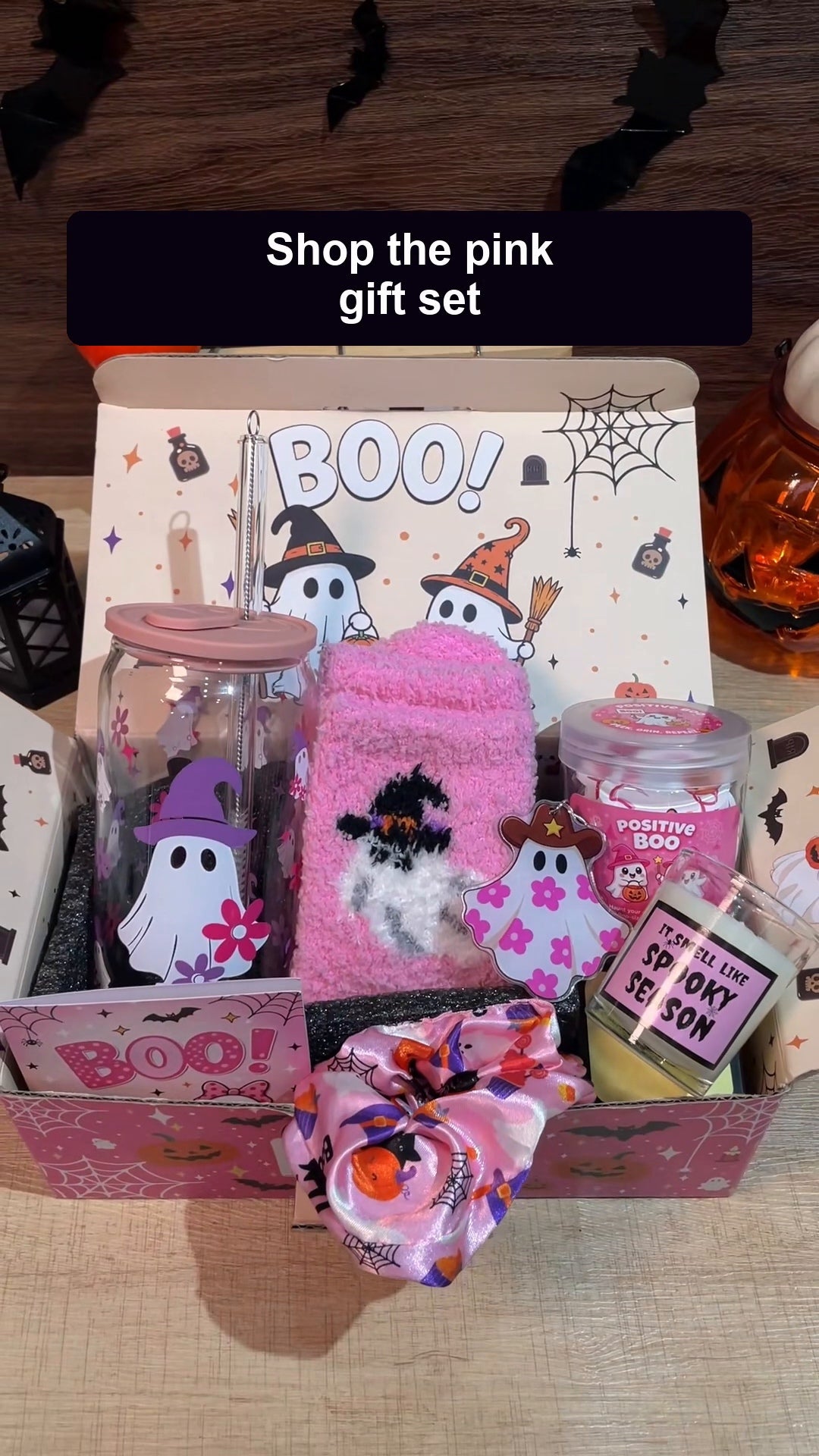 Unboxing the ANOTION pink Halloween Boo Basket gift set and showing its included gifts in the box.
